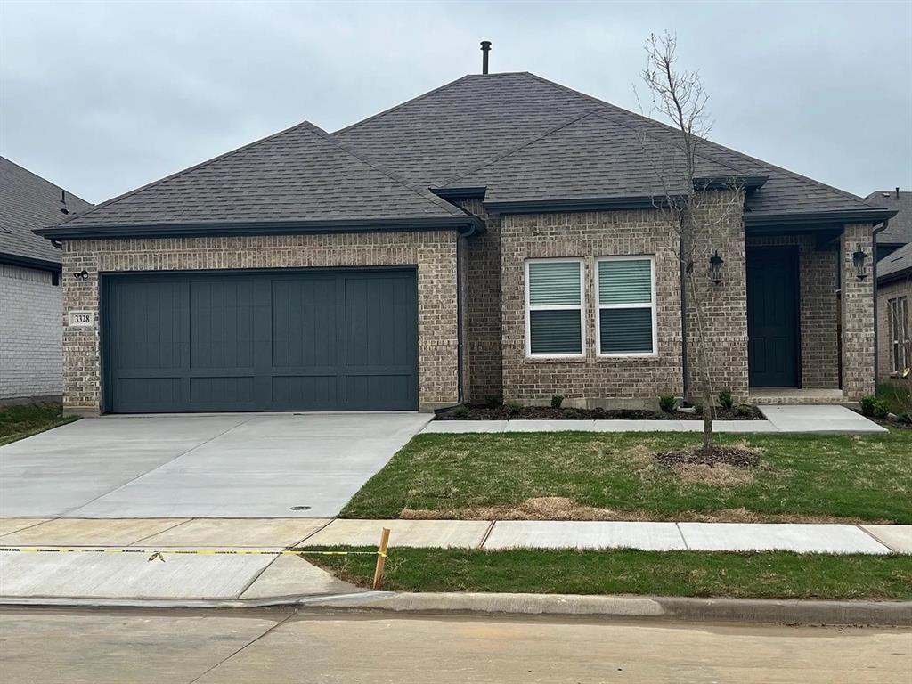 a front view of a house with a garage