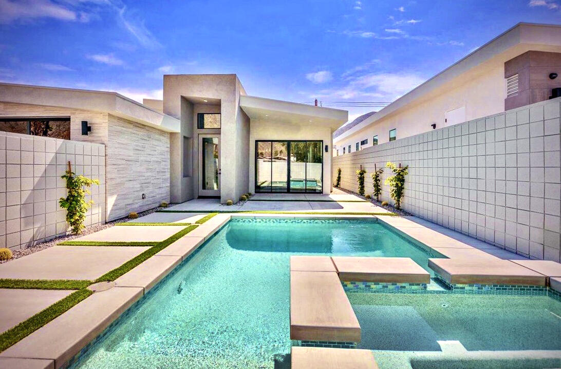 a view of swimming pool with a backyard