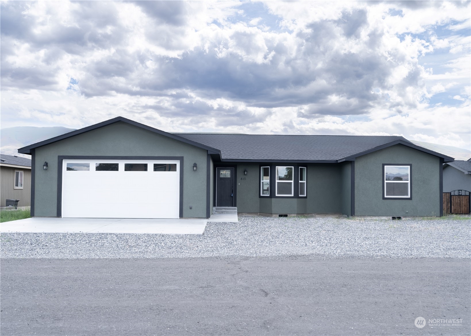 a house with yard in front of it