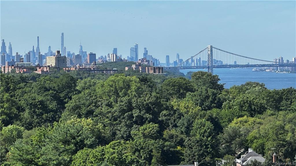 a view of a city with tall buildings