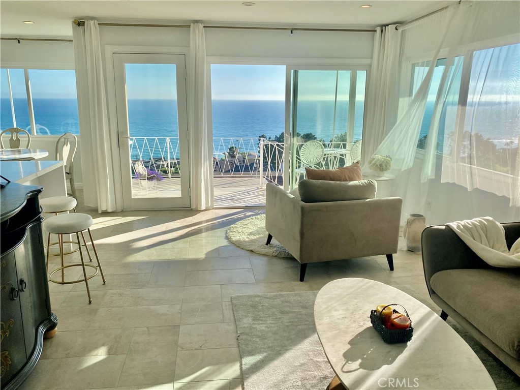 Sit down ocean views in living room.