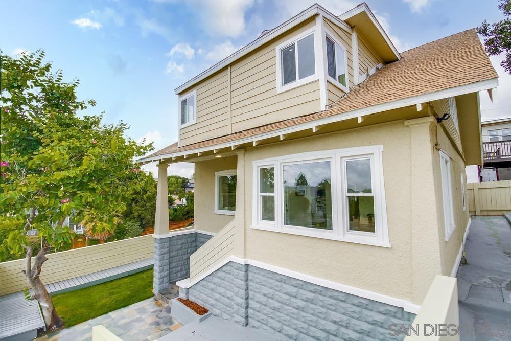 a front view of a house with a porch