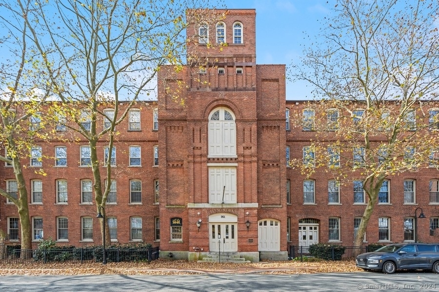 a view of a building with a street