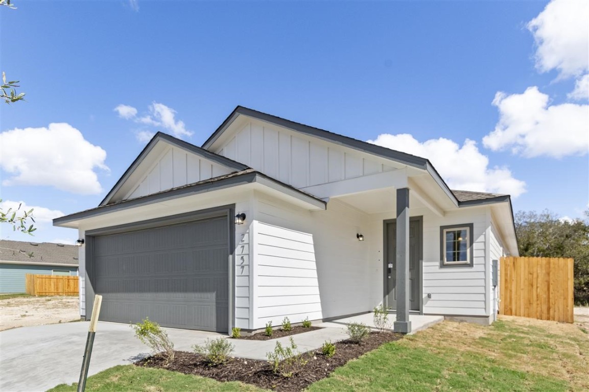 a front view of house with yard