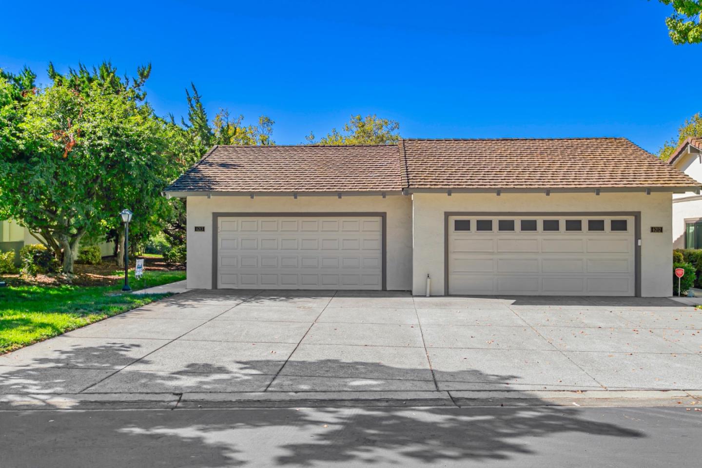 a front view of a house with a garage