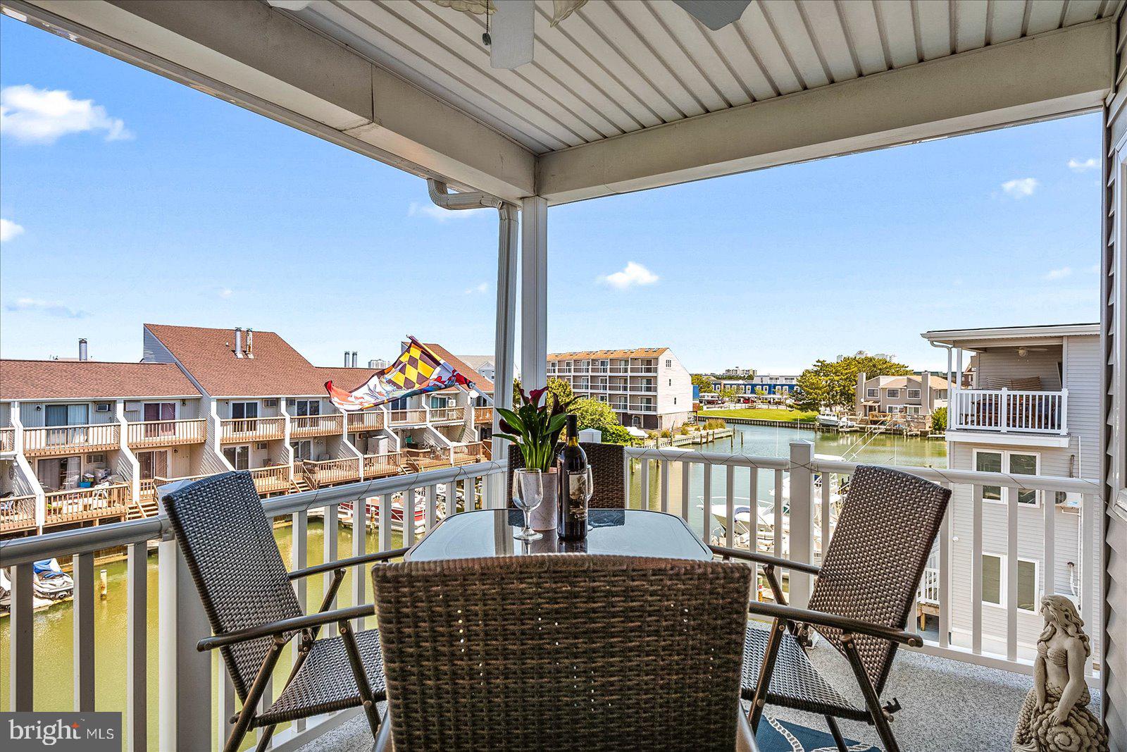 a view of a chairs and table in patio