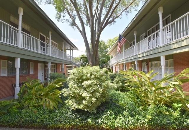 a front view of a multi story residential apartment building