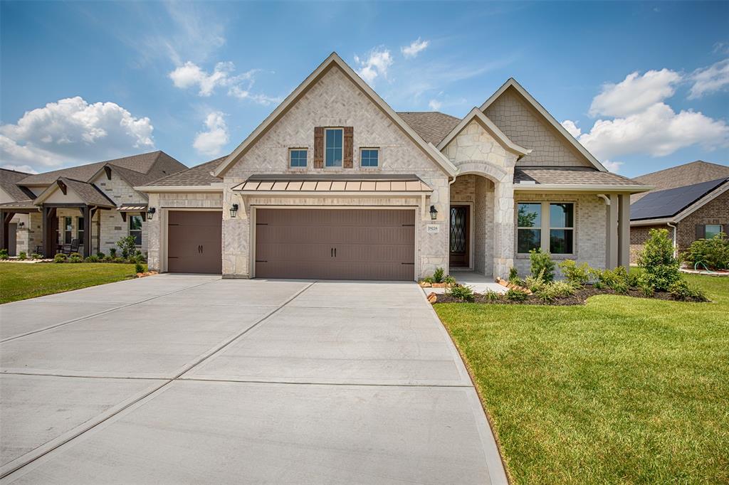 This exquisite three-bedroom home is now available for lease, offering a perfect blend of modern elegance and serene surroundings. As you approach the property, you'll immediately notice its captivating stone elevation, adding a touch of timeless beauty to the exterior.