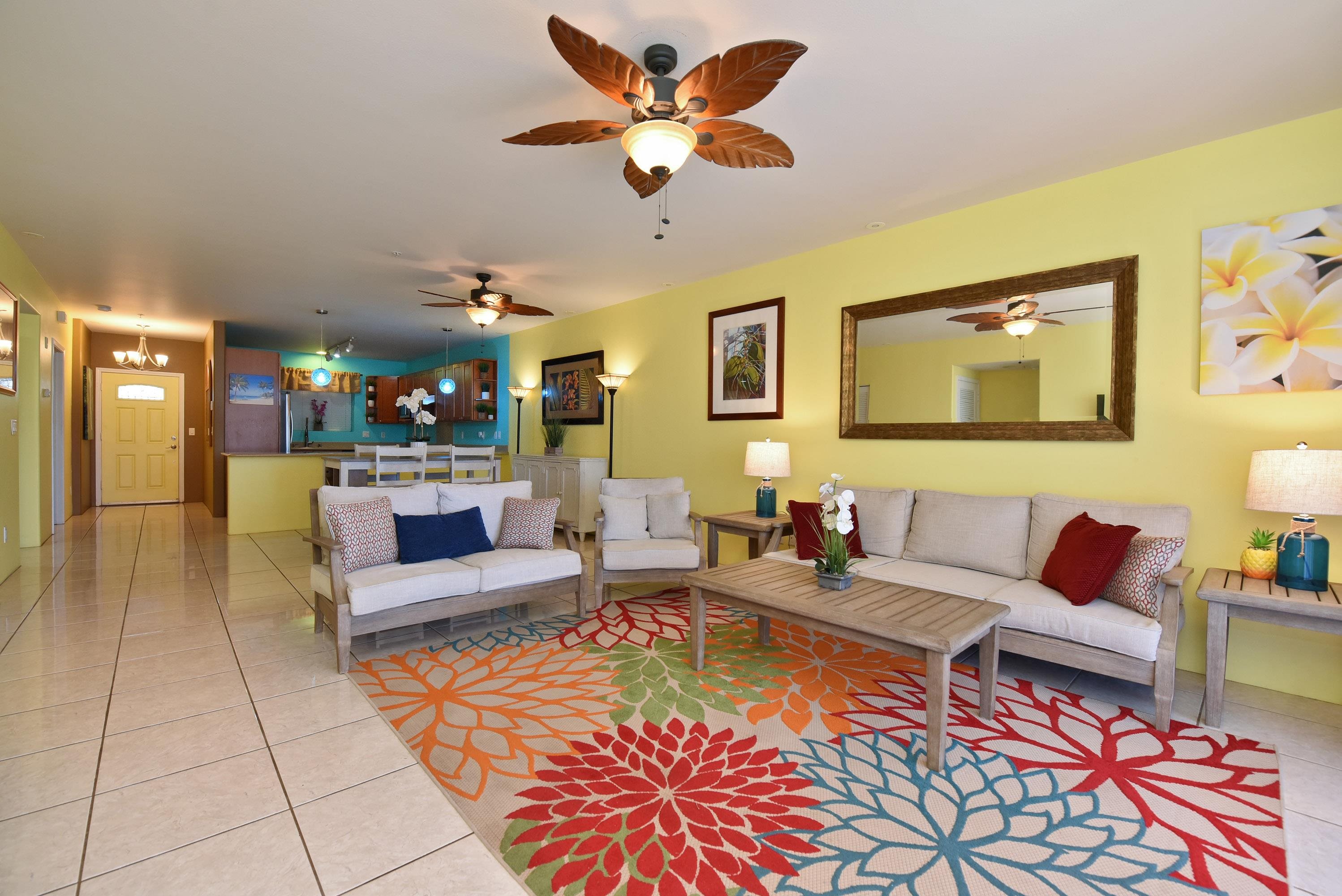 a living room with furniture and a rug