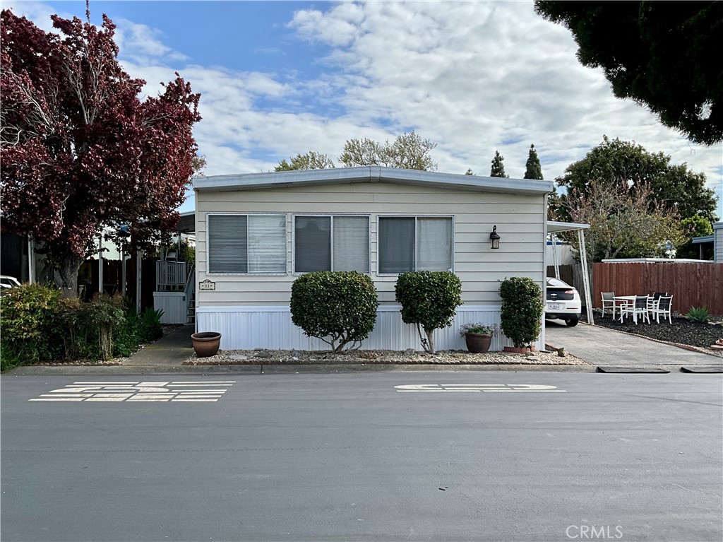 front view of a house with a street