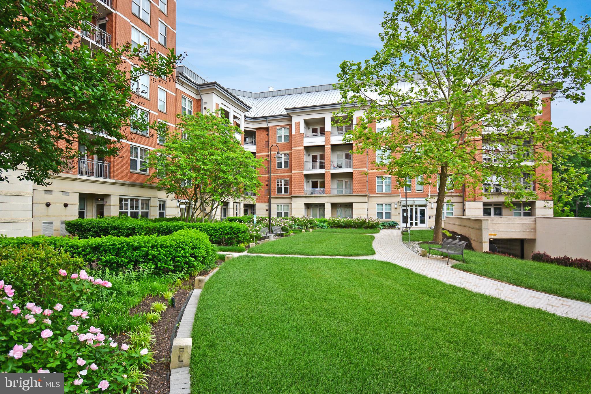 a view of a building with a yard