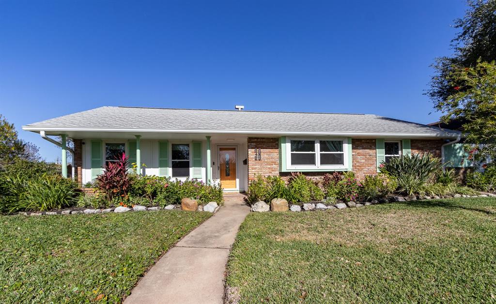 38 Willow Lane. Corner house with a wonderful wrap-around front yard.