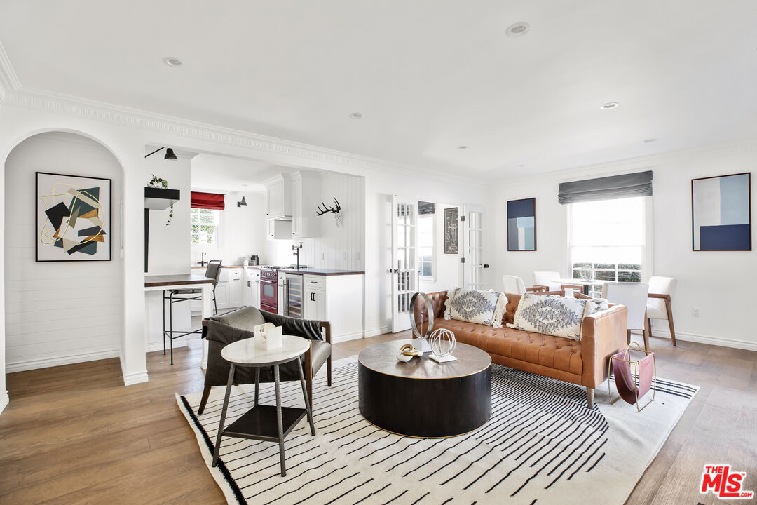 a living room with furniture or couch and a window