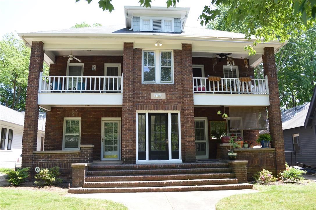 a front view of a house with a porch