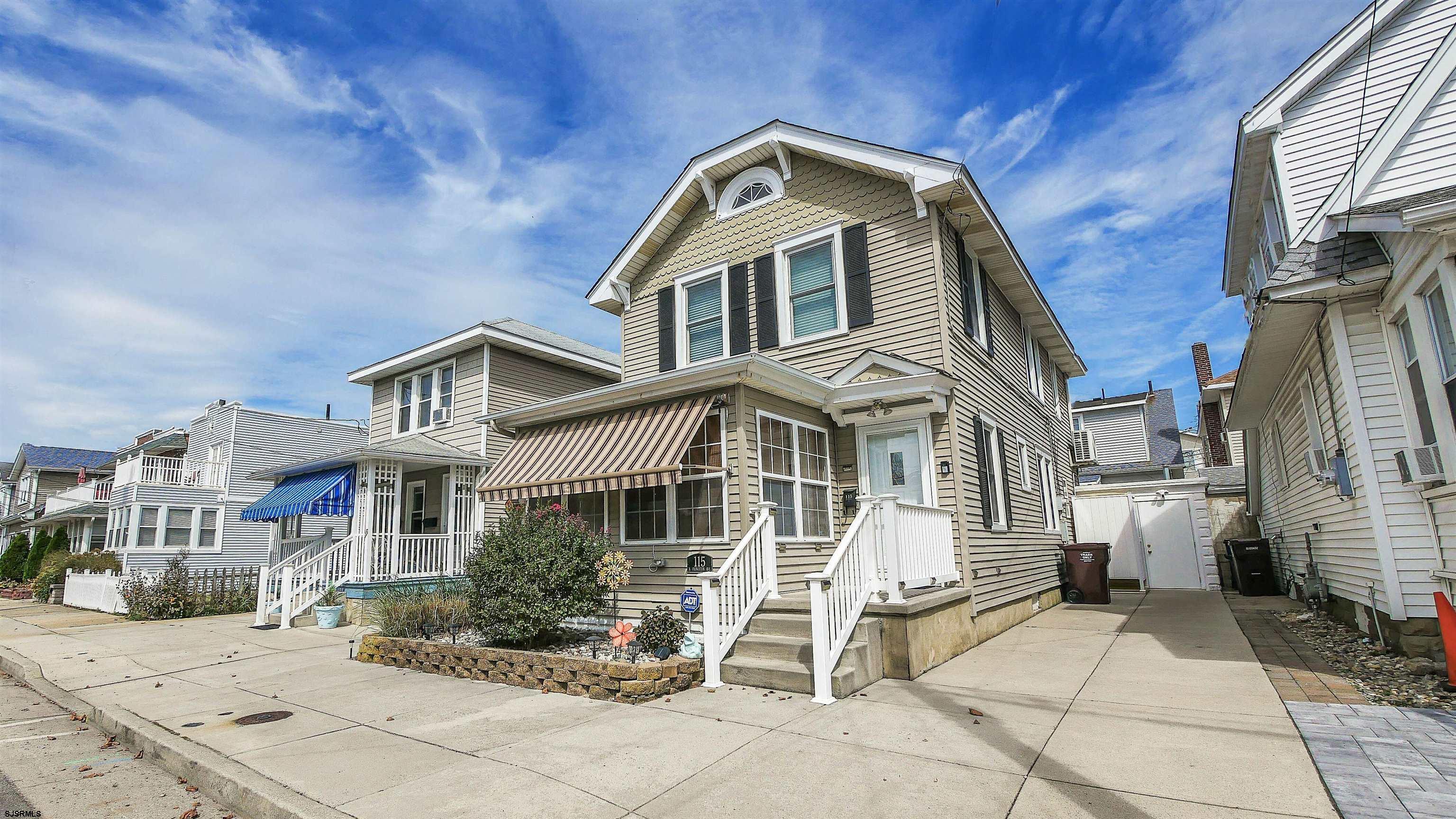 a front view of a house with a porch