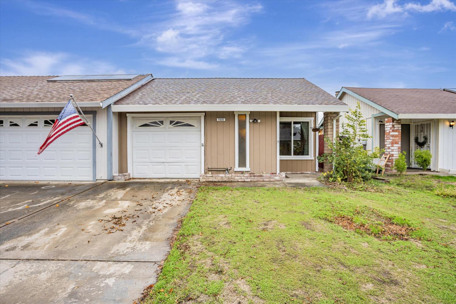 front view of house with a yard