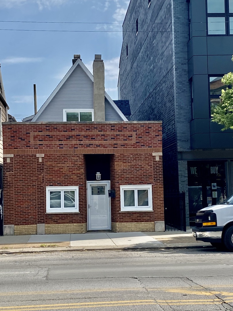 a front view of a house with a garage