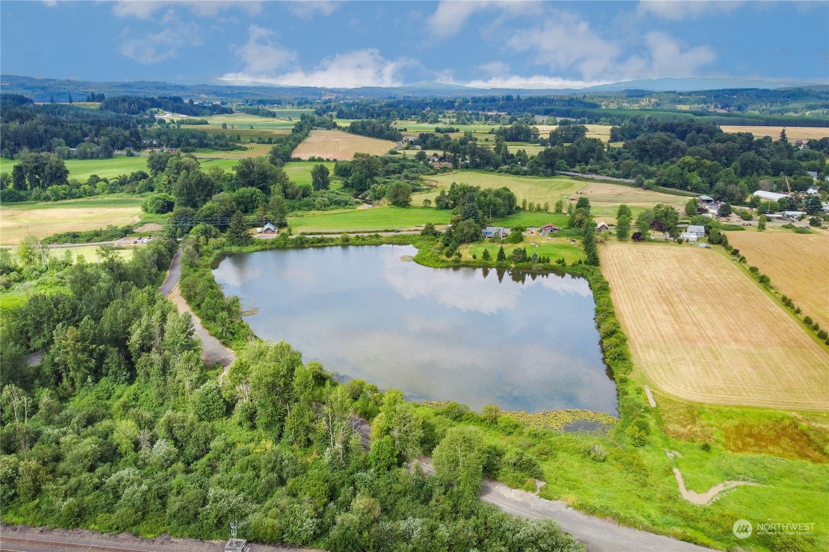 a view of a lake with a city