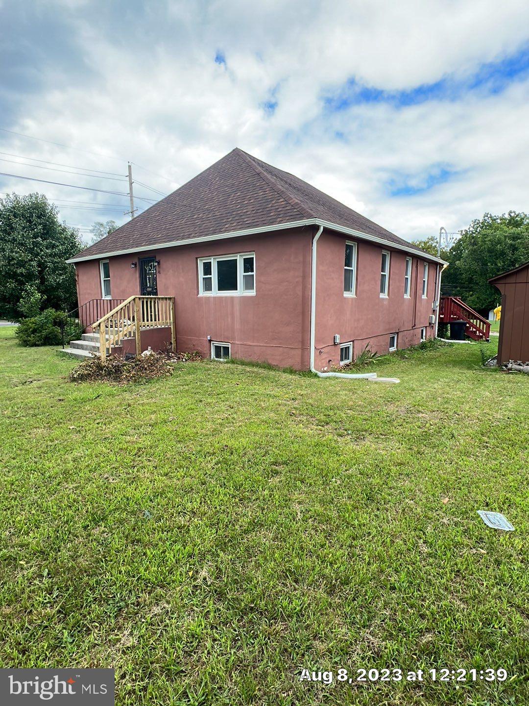 a front of a house with a yard