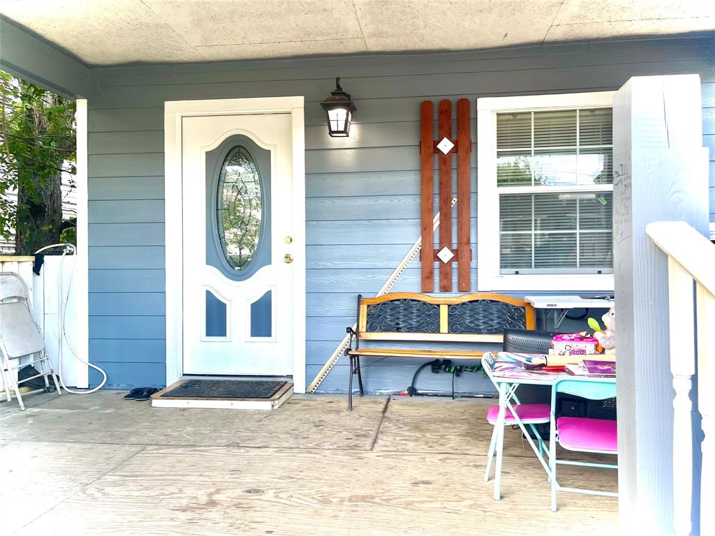 a house view with outdoor seating space