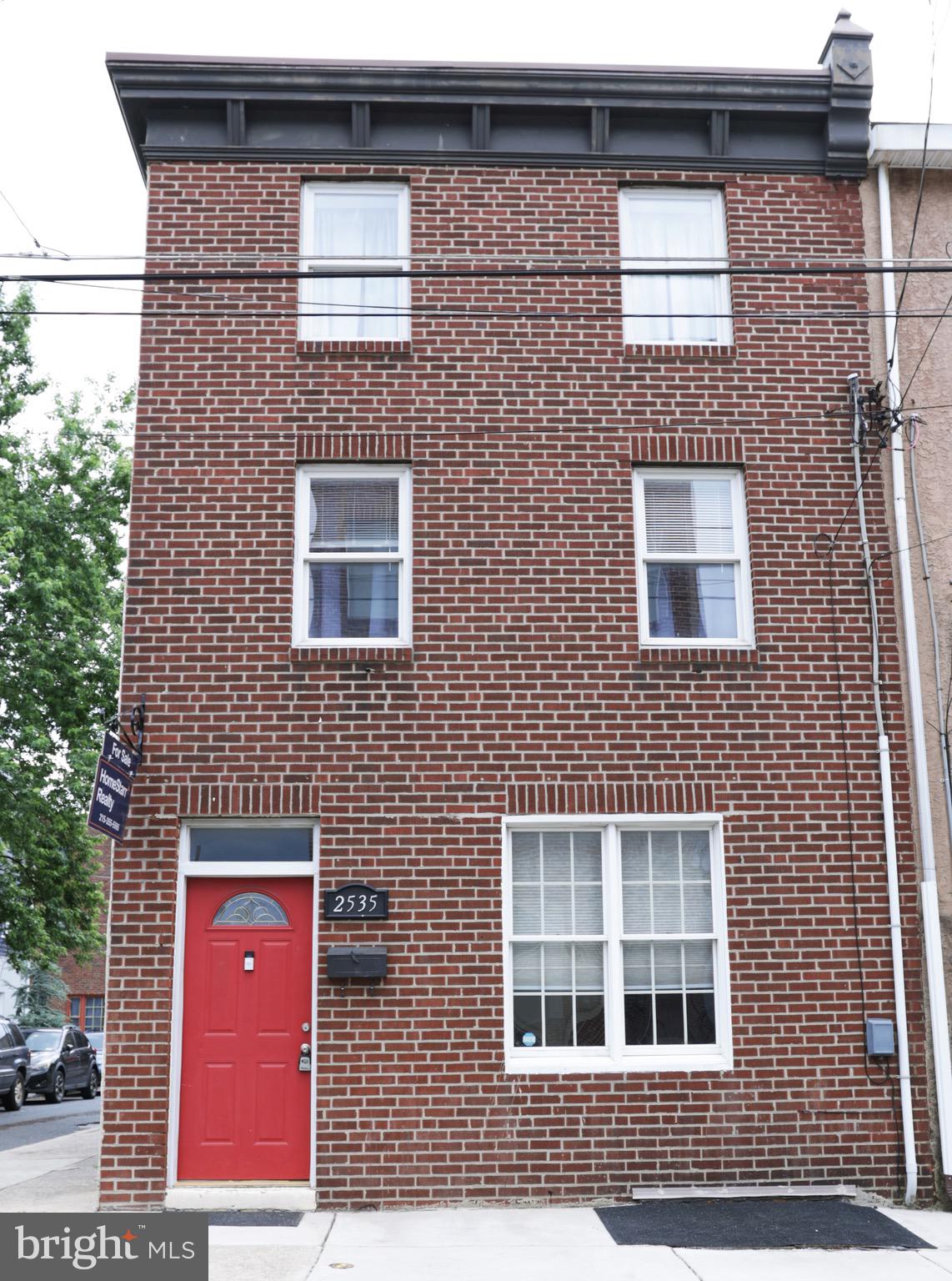 a front view of a building with windows