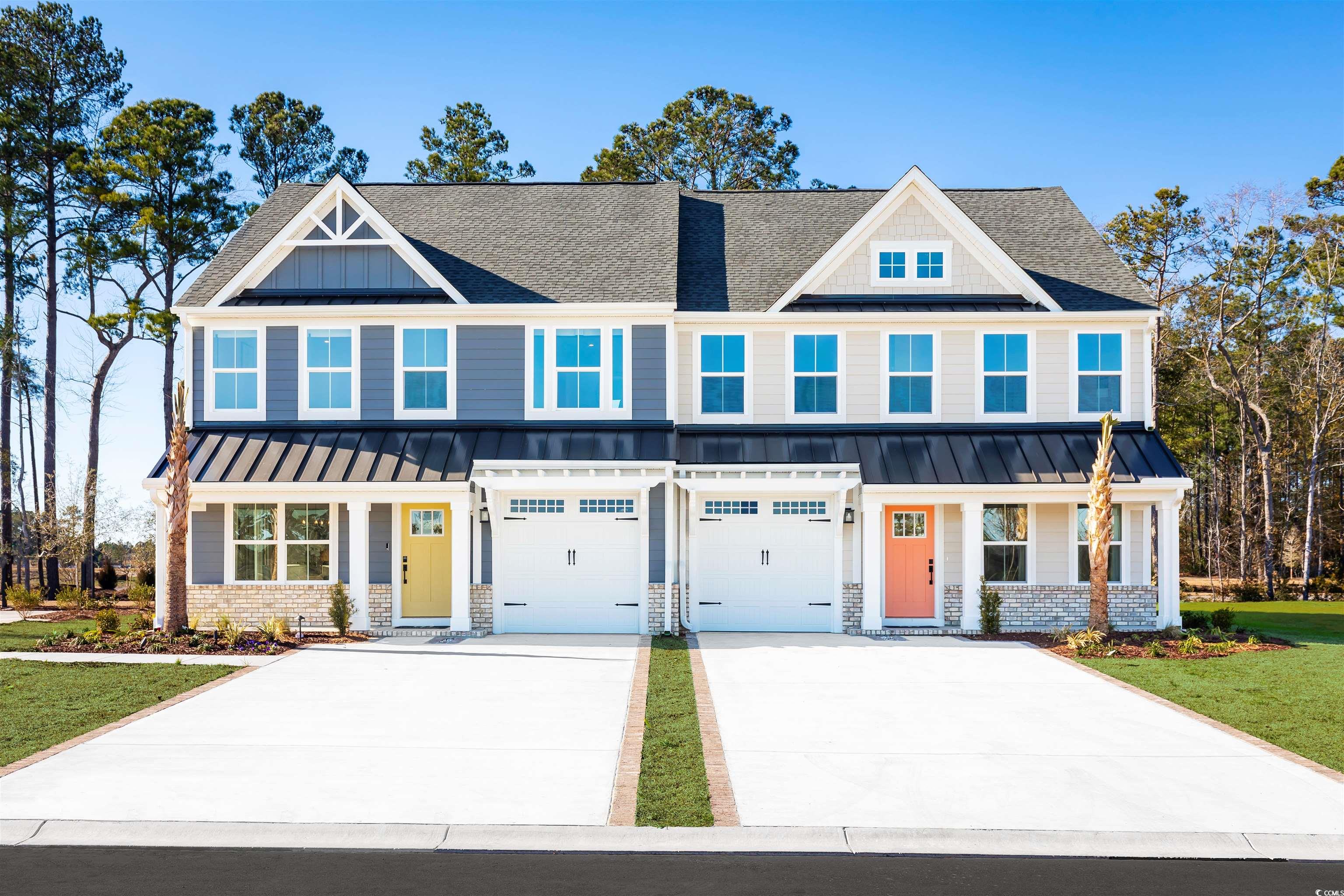 Craftsman house with a garage