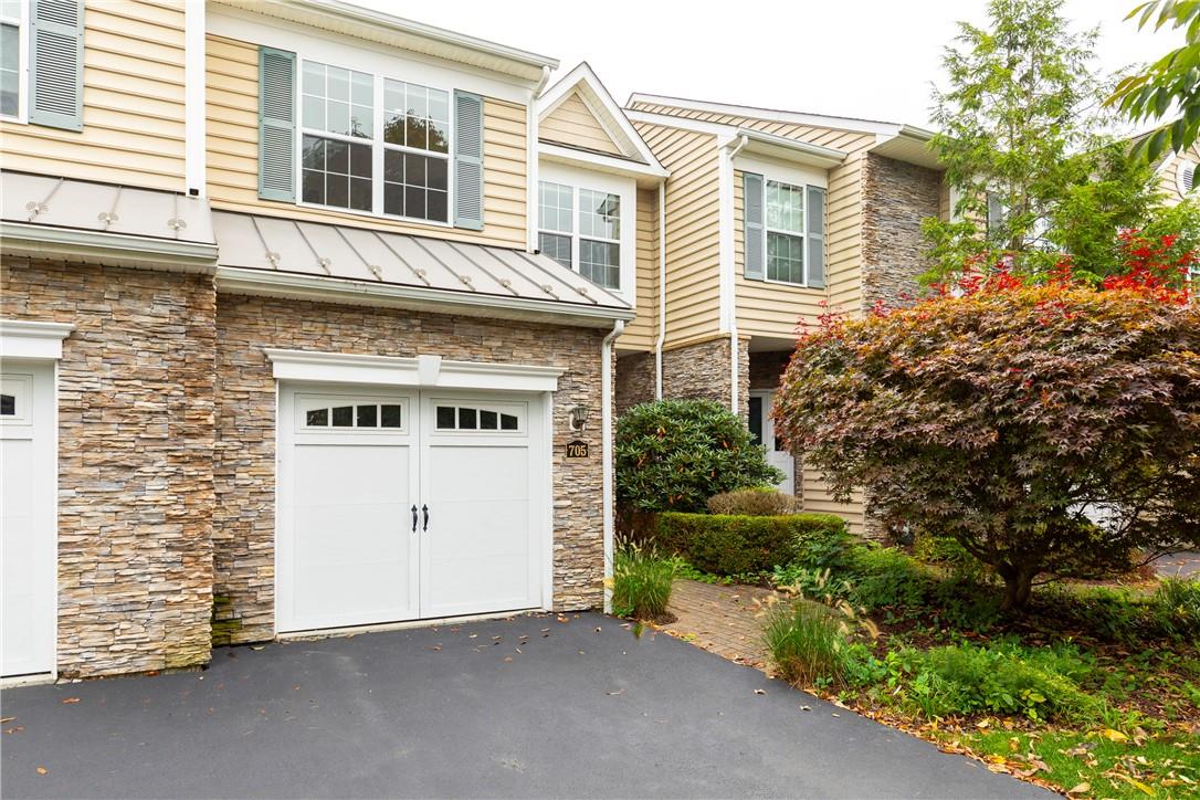 a view of a house with a garage