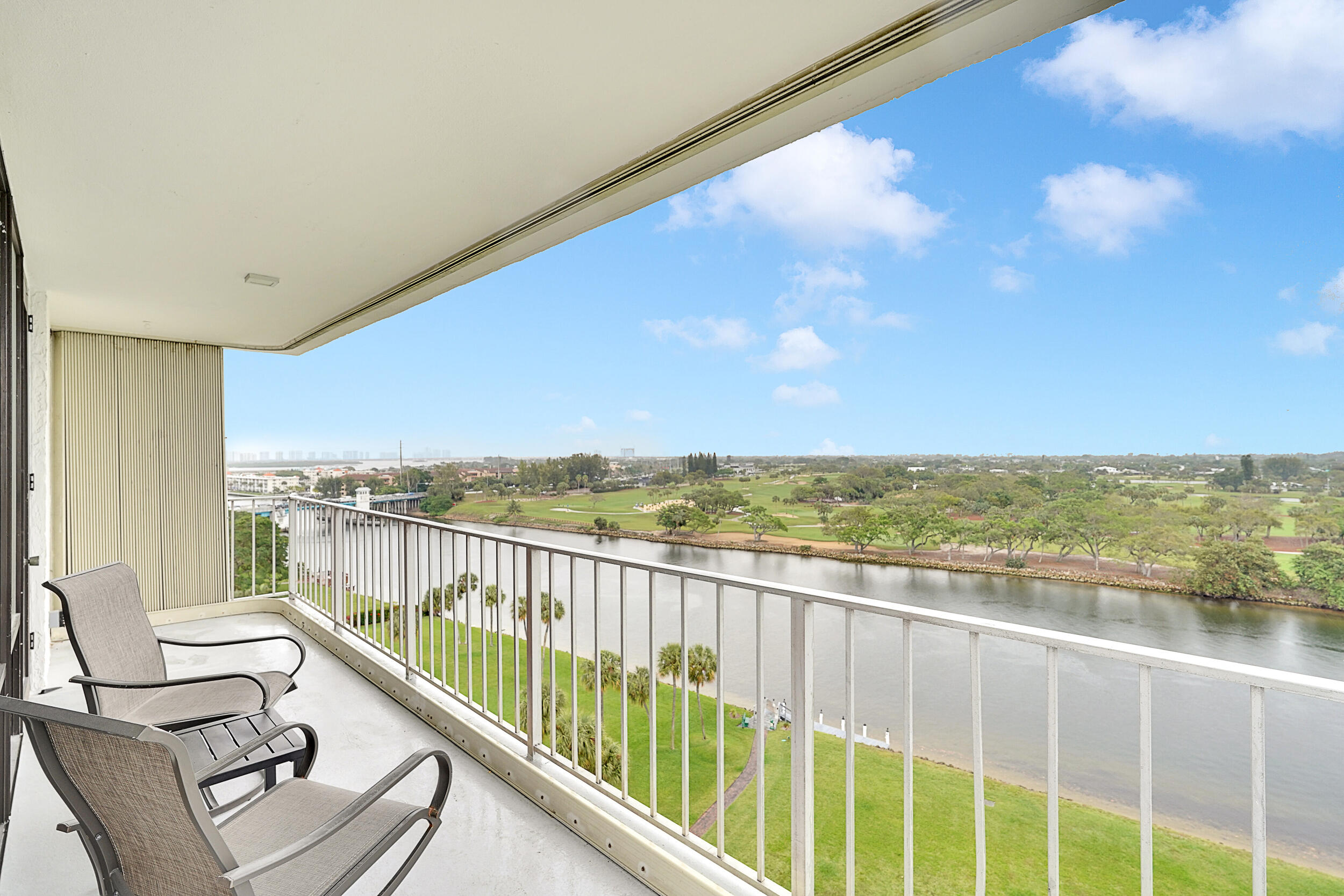 a view of a balcony with lake view and ocean view