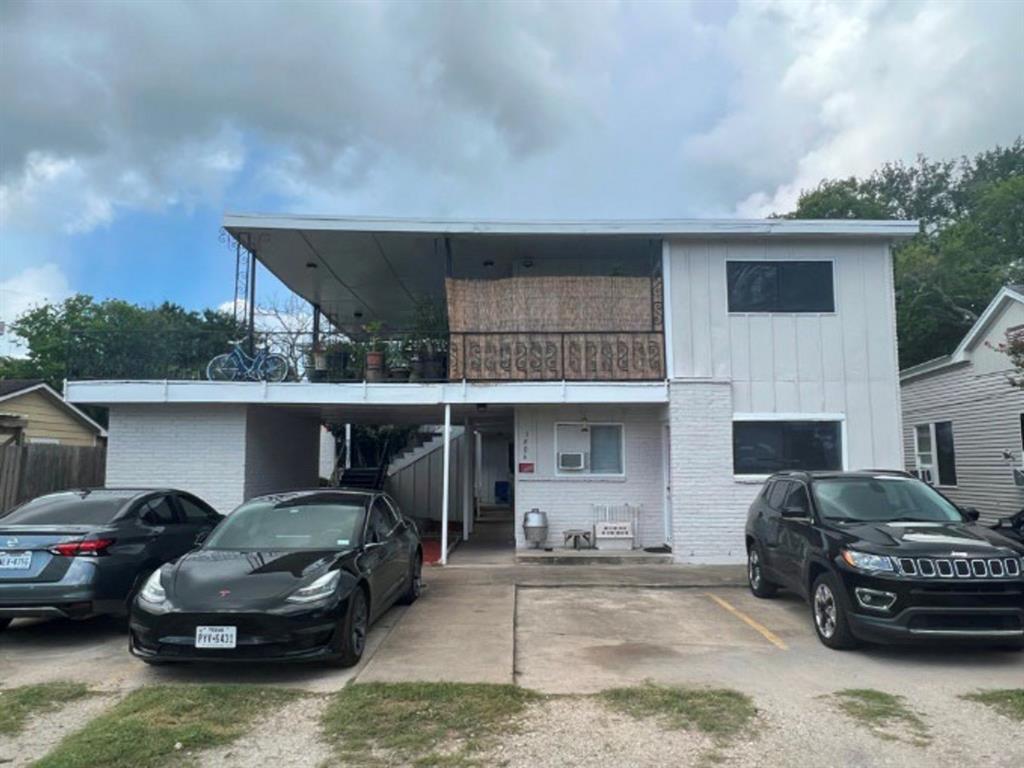 a car parked in front of a house