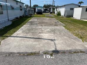 a view of a back yard of the house