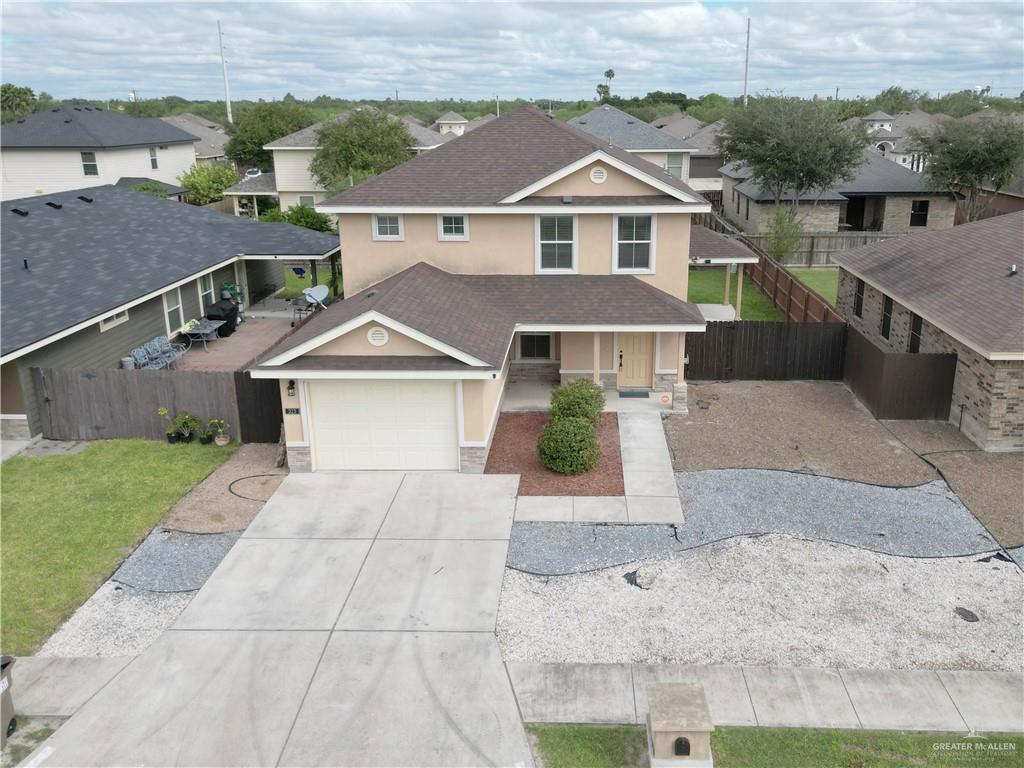 View of front property with a garage