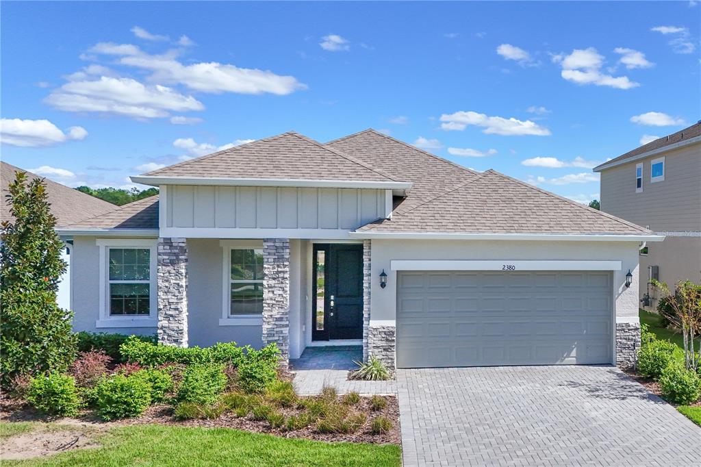 front view of a house with yard