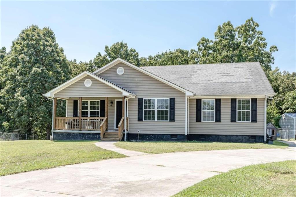 front view of a house with a yard