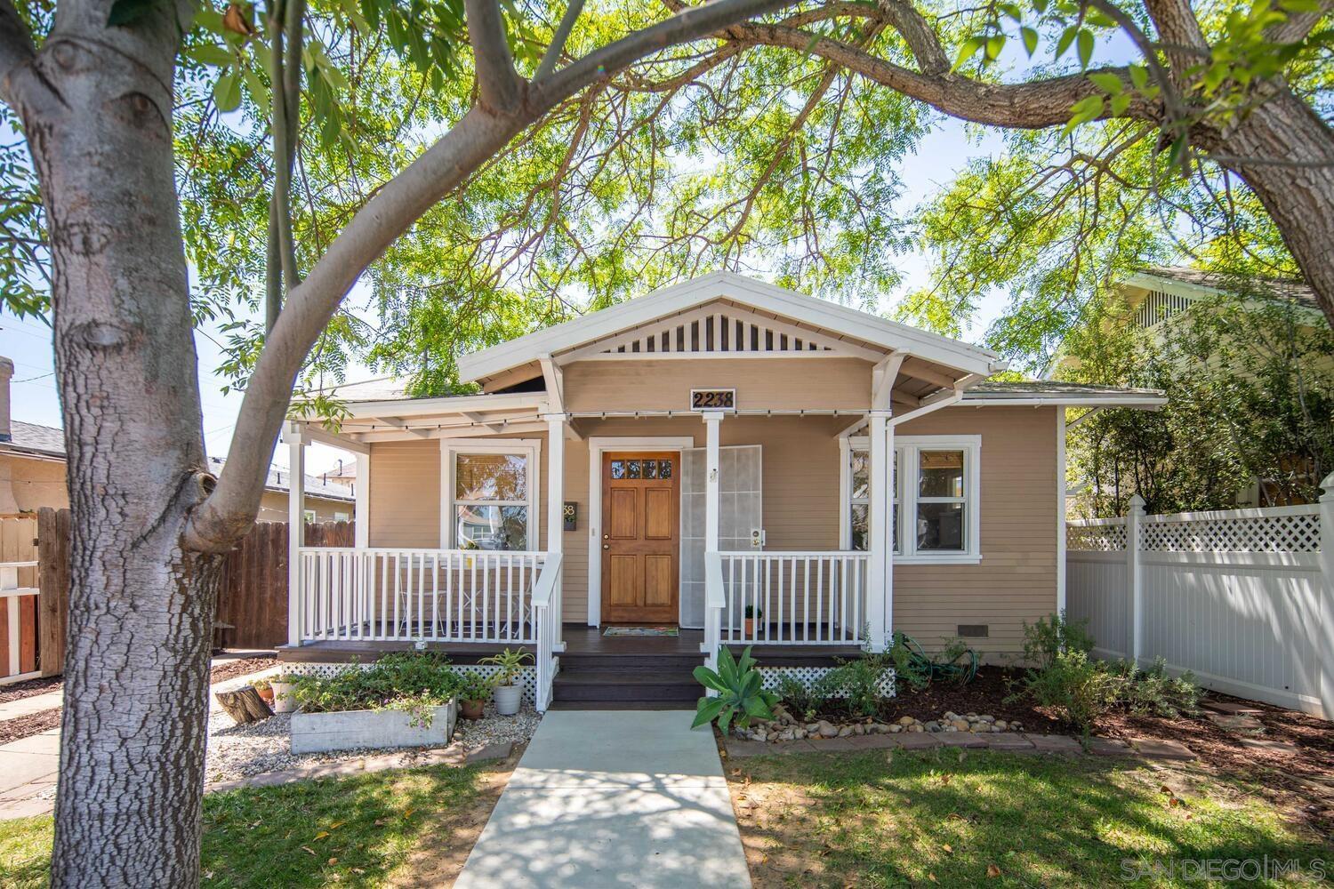 front view of a house with a small yard