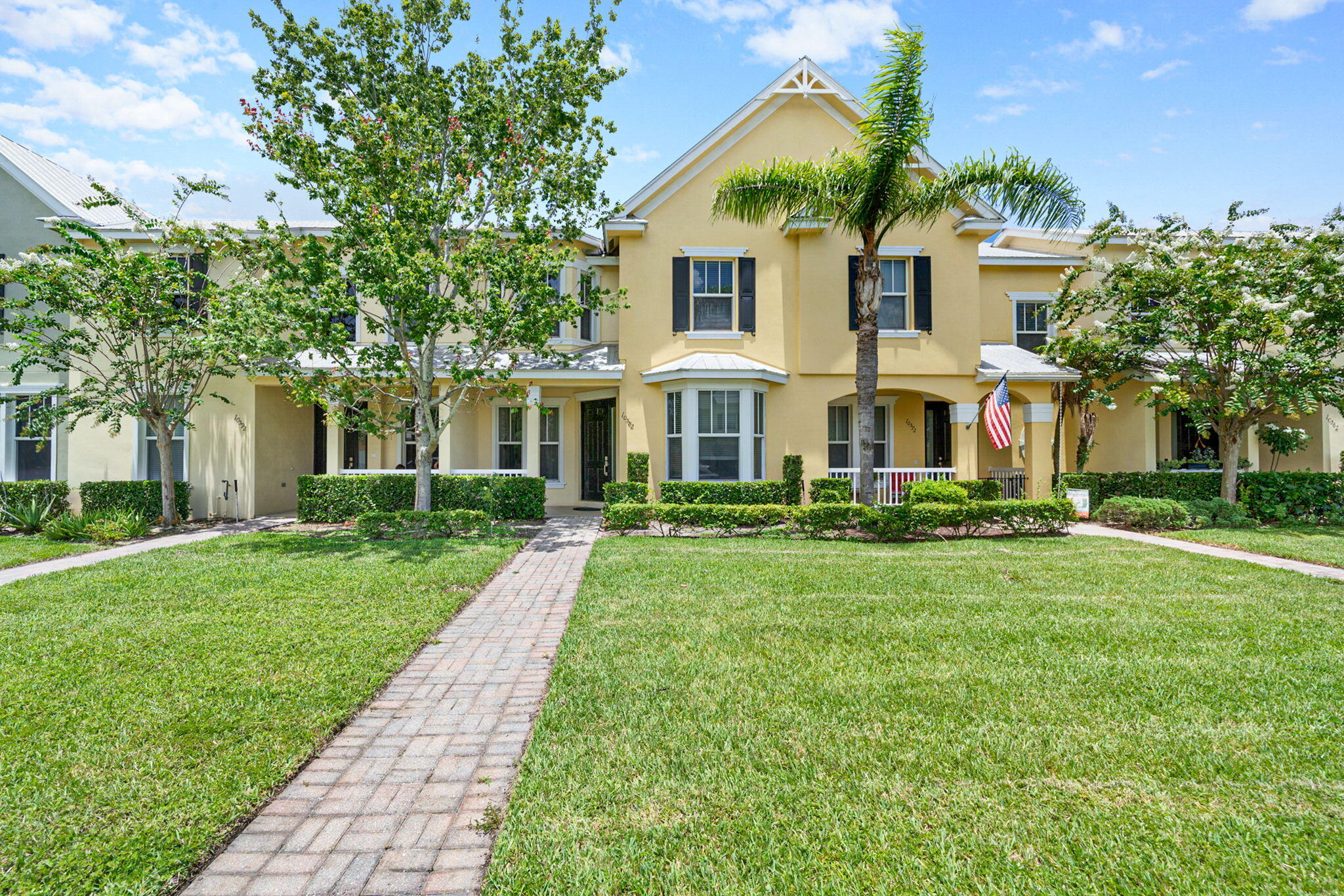 front view of a house with a yard