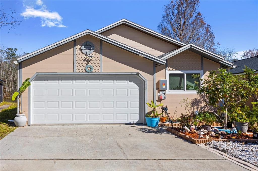 a view of a house with a garage