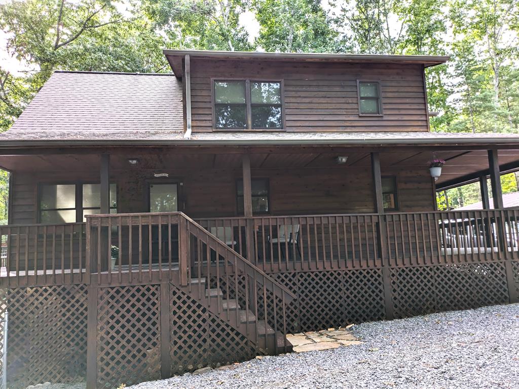 a view of outdoor space with a deck