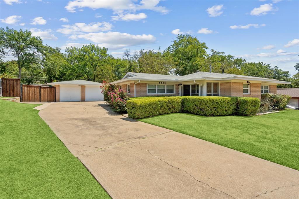 a house view with a garden space