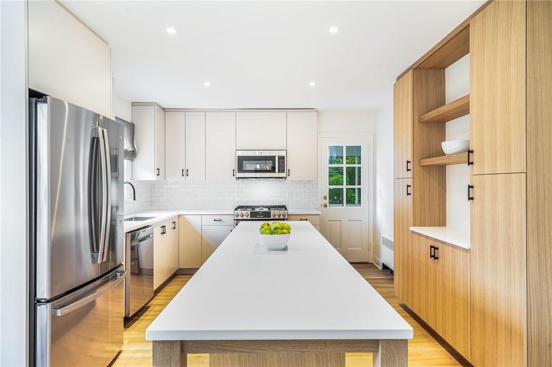 Brand New Kitchen with Stainless Appliances and Custom Cabinetry