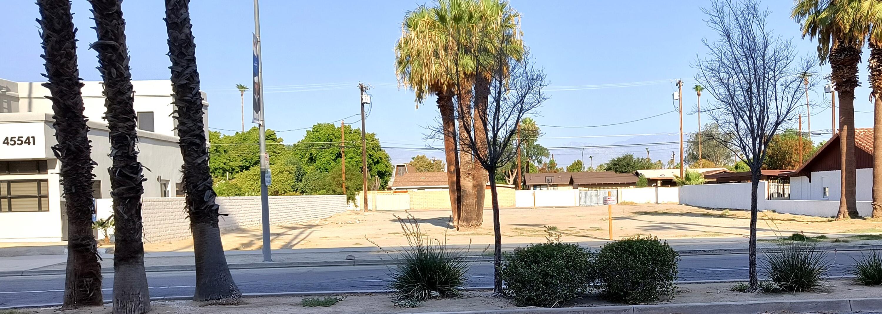 a view of a backyard of the house