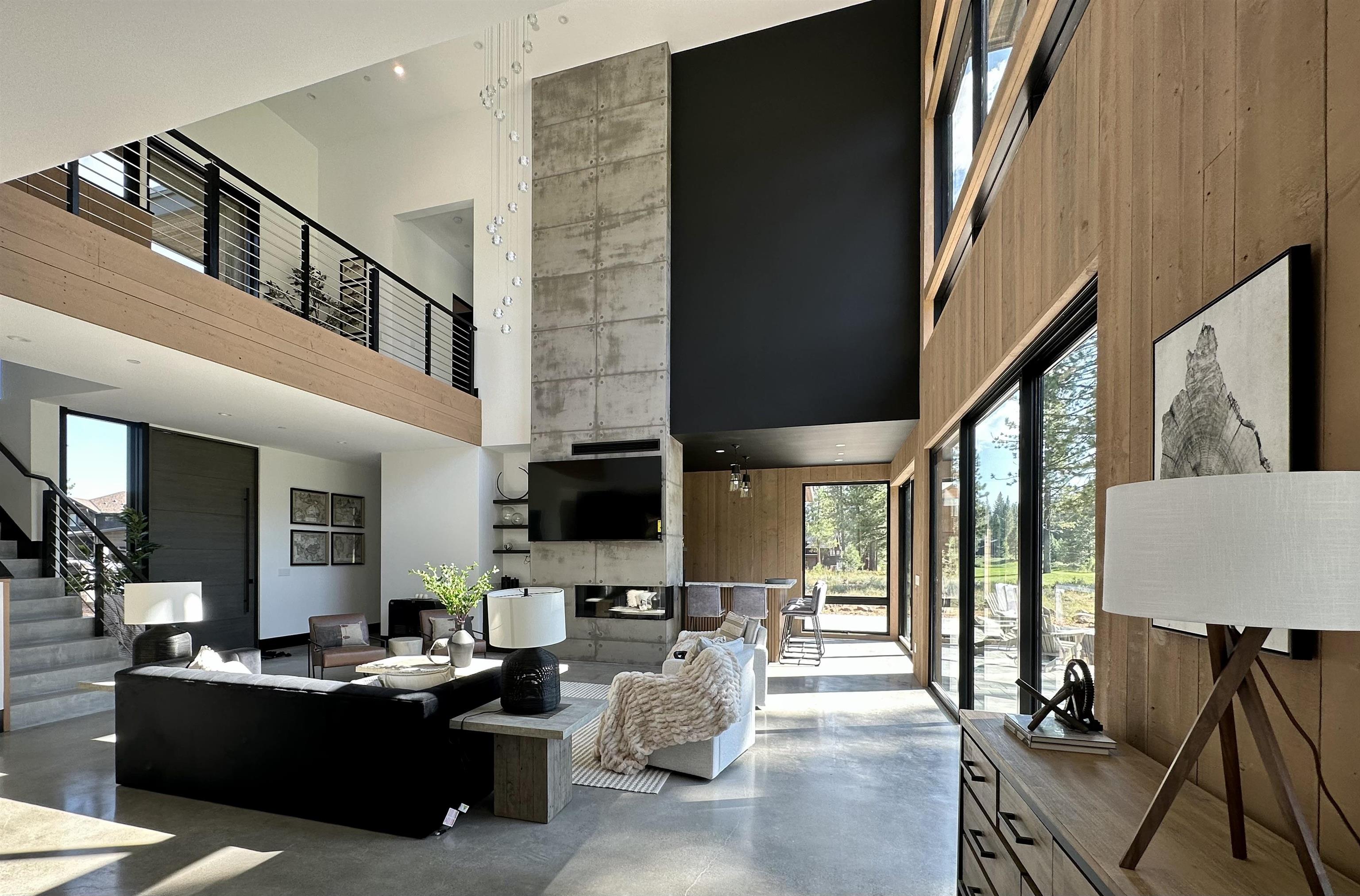 a living room with fireplace furniture and a flat screen tv