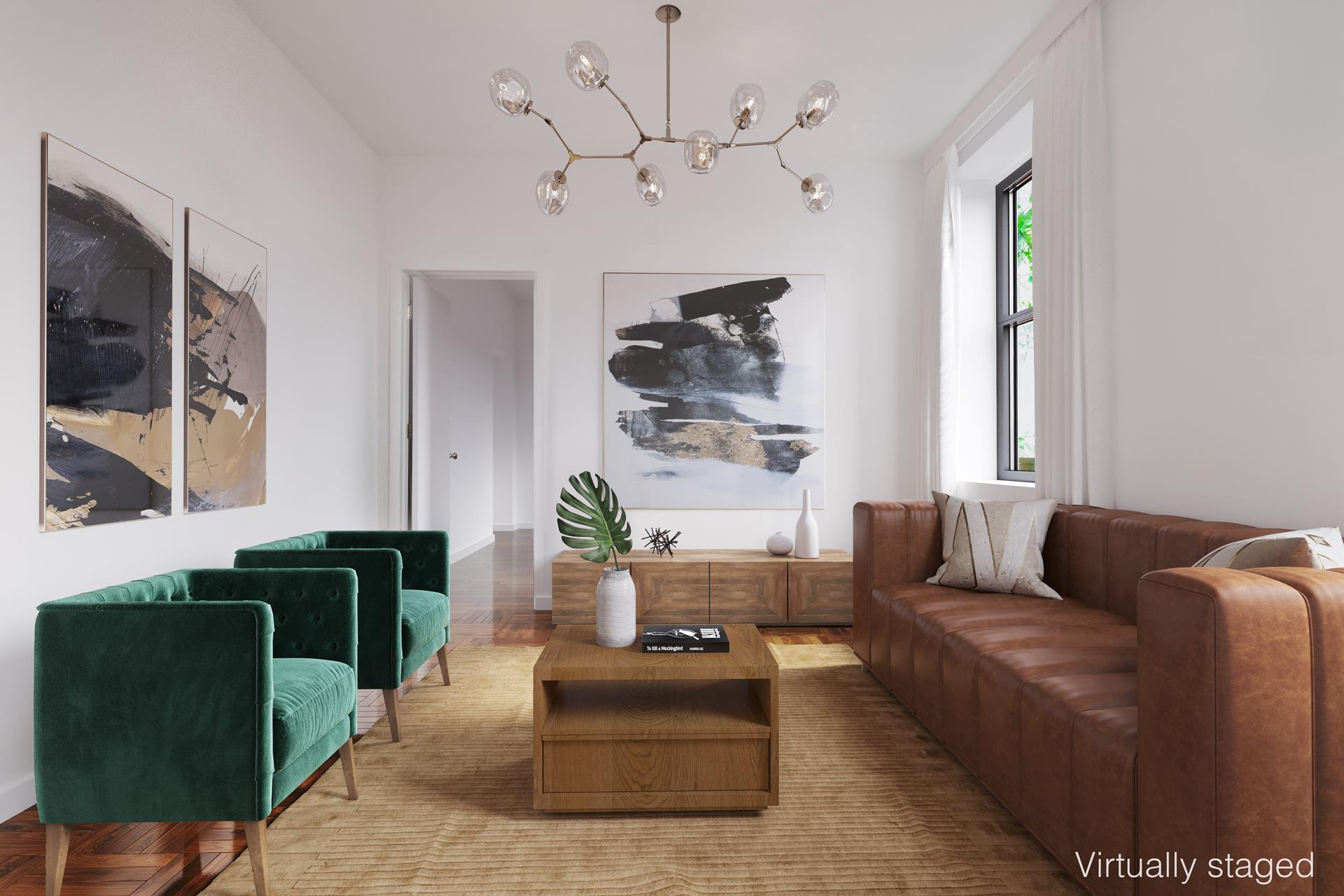 a living room with furniture and wooden floor