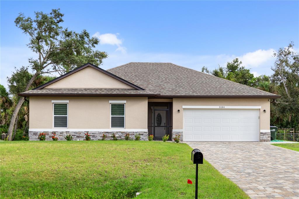 a front view of house with yard