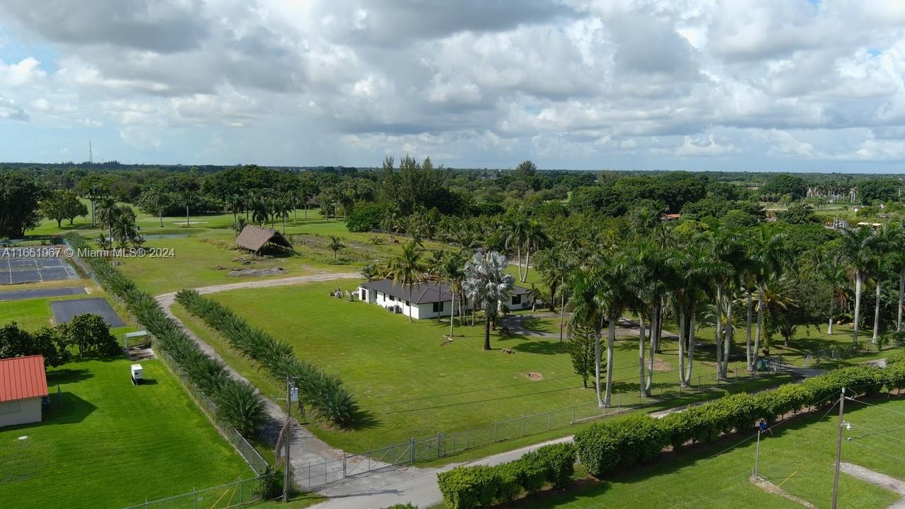 a view of a golf course with a garden