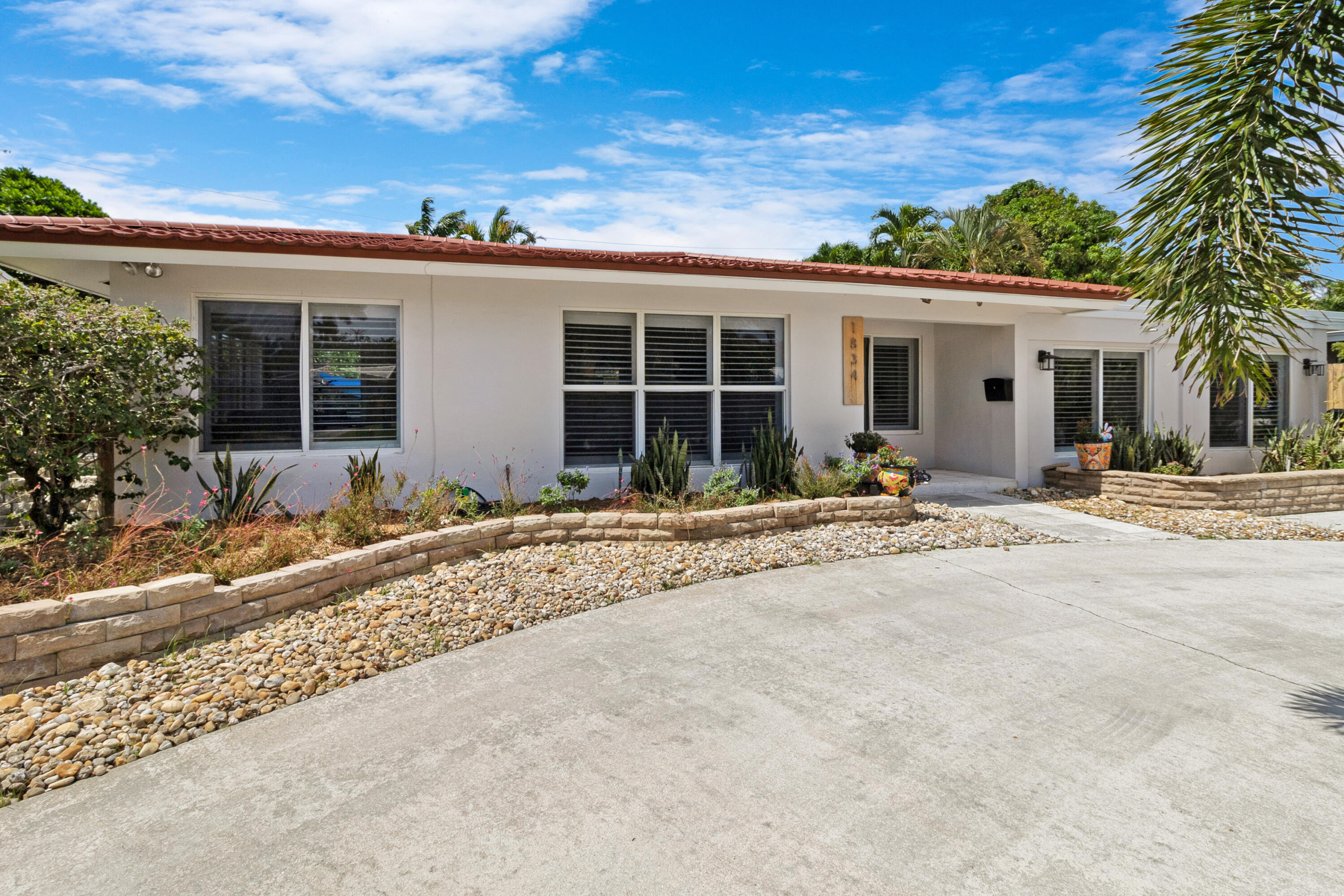 front view of a house with a patio