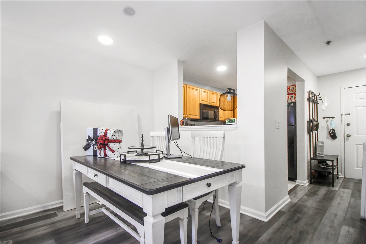 a kitchen with a sink and a refrigerator