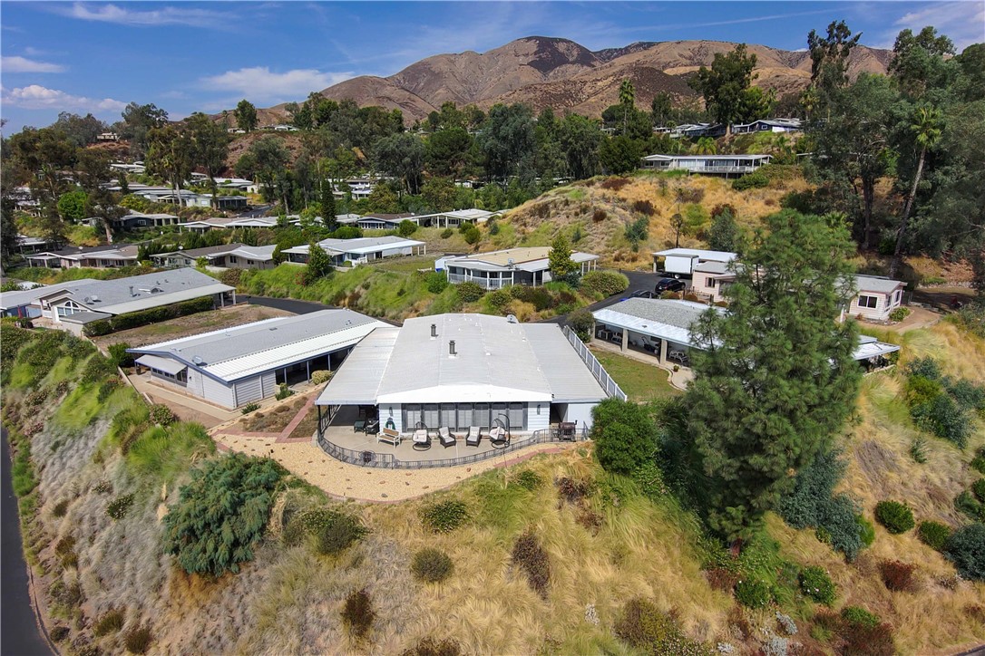 an aerial view of a house with a garden