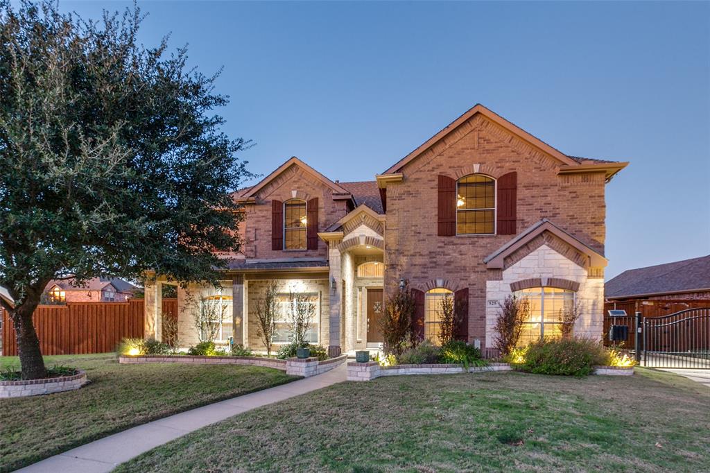 Beautiful curb appeal day or night.