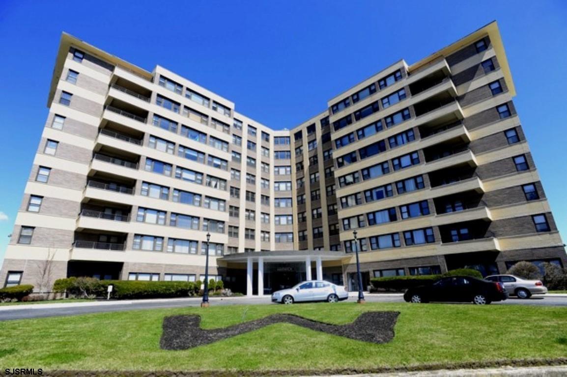 a view of building with yard