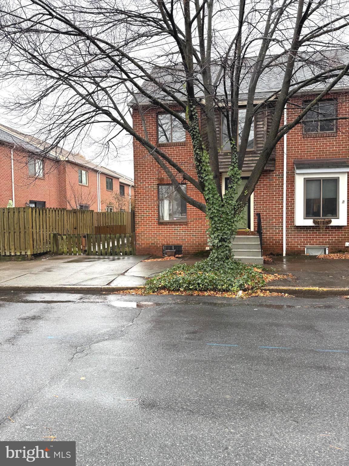 front view of a house with a street